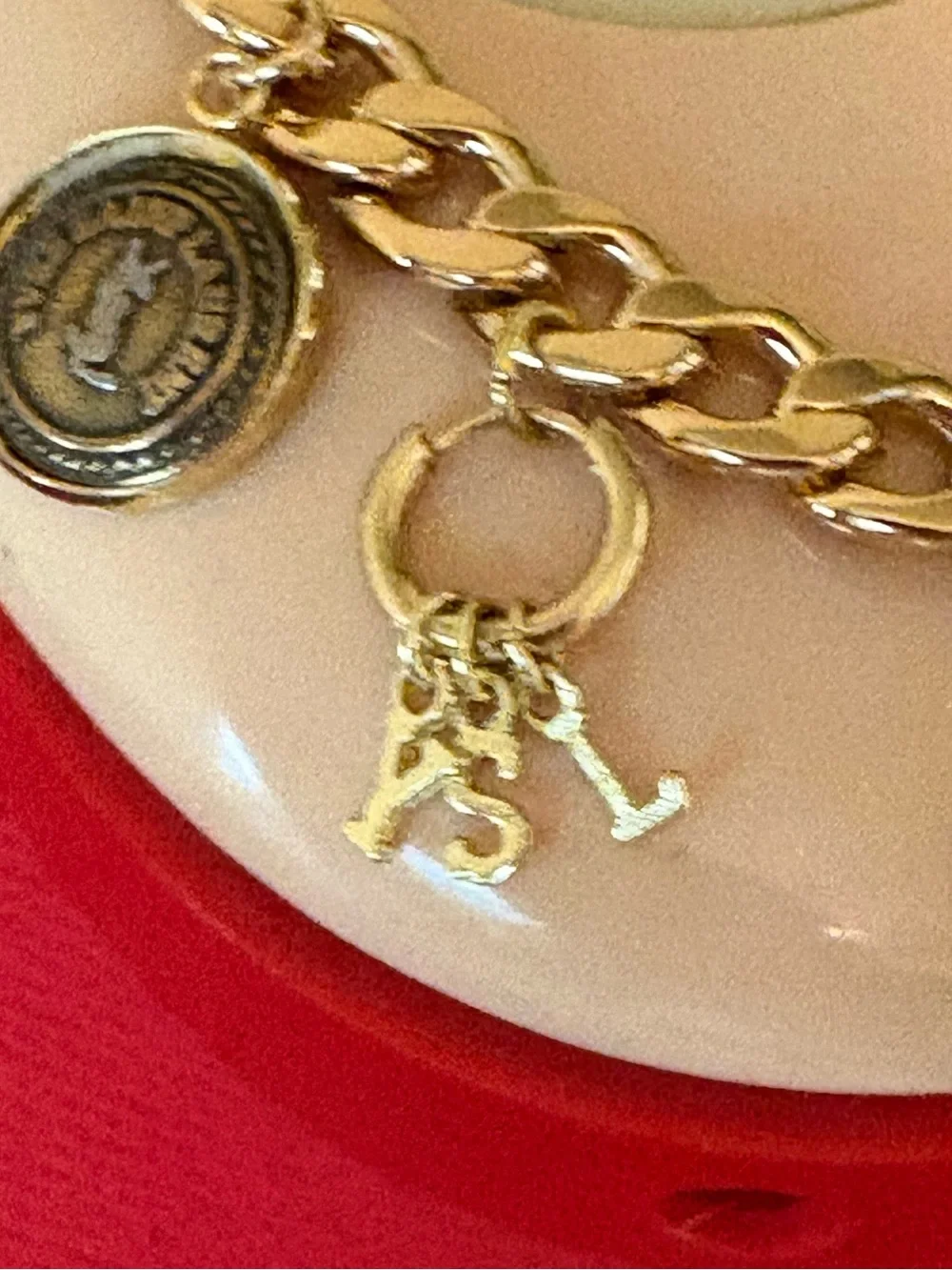 Authentic YSL charms and unbranded letter  charms on unbranded bracelet chain